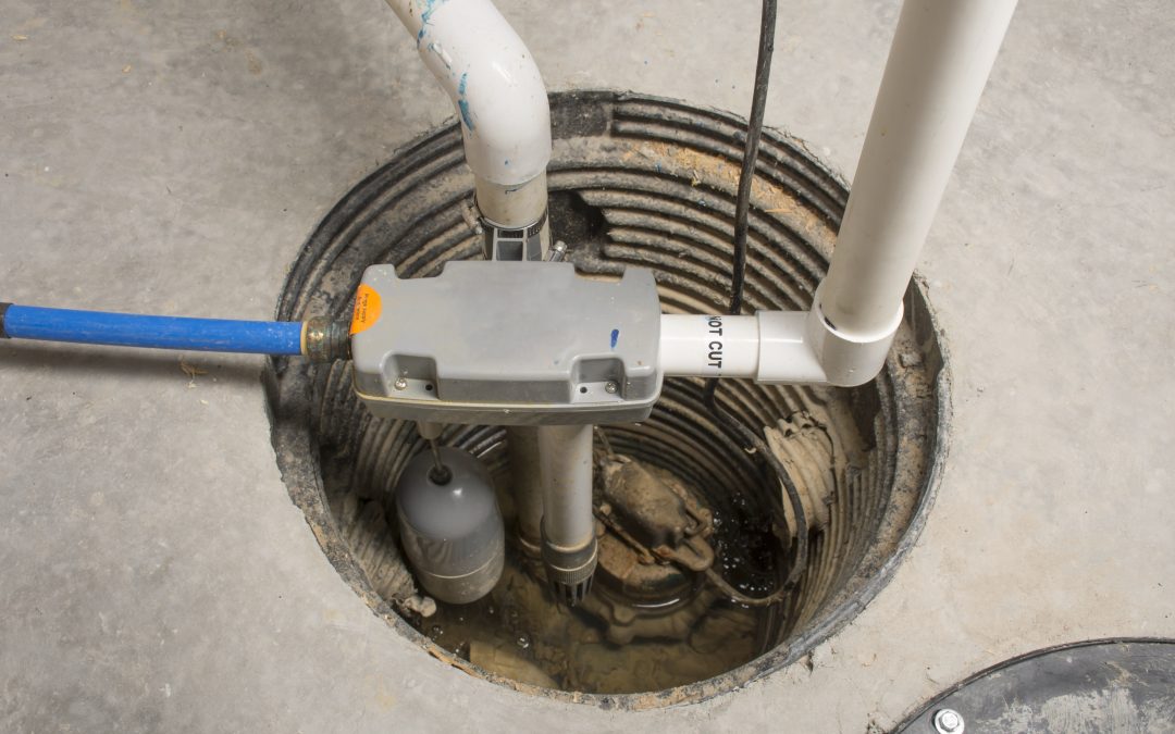 A backup sump pump pumps water out of a sump basin.